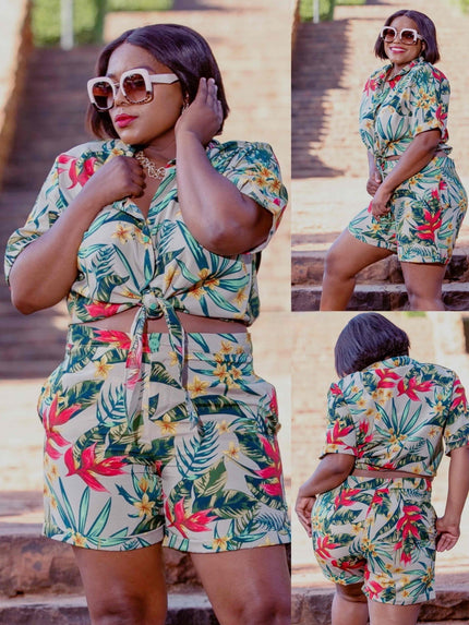 Tropical floral print two-piece set featuring a short-sleeve tie-front shirt and high-waisted shorts