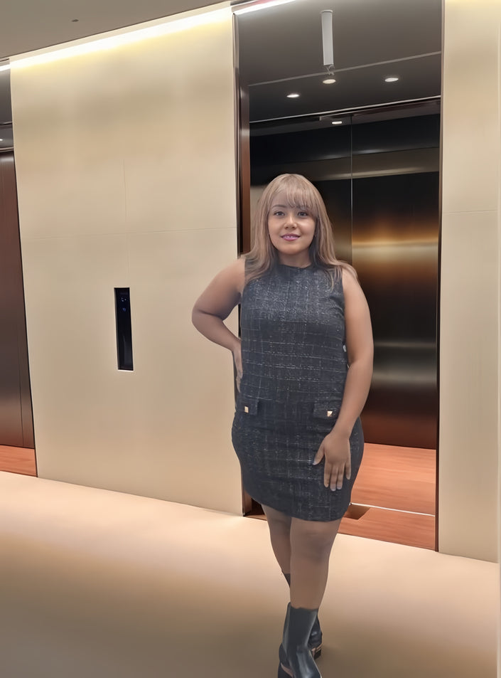 Elegant Sleeveless Mini Dress with Button Accents and Waist Pocket Design