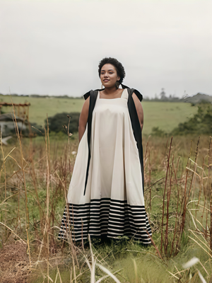 Women's Maxi Dress  Contrast Strap Design  Striped Hemline Detail  Flowing Silhouette