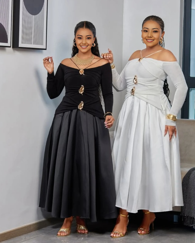 Elegant Long-Sleeve Color-Block Dress with Gold Decorative Buckles for a Sophisticated Look