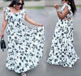Floral maxi dress with cutout back, ruffle trim, white with black floral print