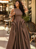 Brown sleeveless corset-waist maxi gown with draped bodice and layered skirt