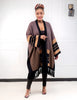 Striped knit cardigan with fringe hem, open front; brown and black striped trim