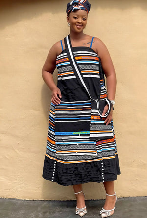 African maxi skirt set with striped geometric panels, navy bodice and black tiered skirt