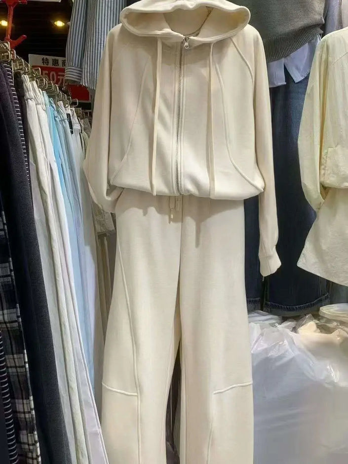 Women’s cream two-piece tracksuit set: zip-up hoodie and wide-leg pants