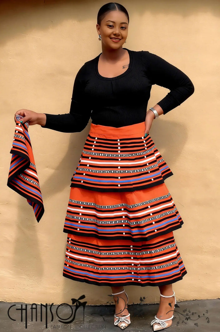 Striped African maxi skirt set with long-sleeve black top, orange and navy striped skirt