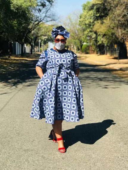 Plus size circular print flared skirt dress, navy and white circles, tied waist bow