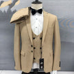 Khaki 3-piece suit on mannequin: peak lapel blazer, double-breasted vest, trousers