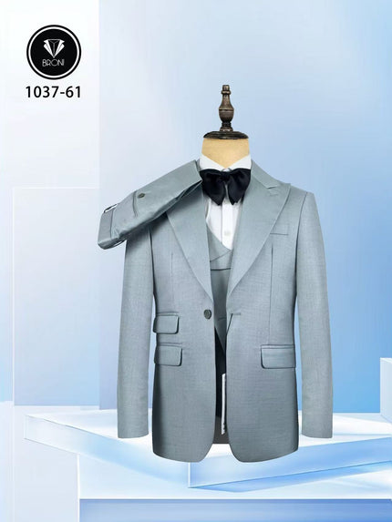 Light grey blue slim fit suit with peak lapels, waistcoat, and black bow tie