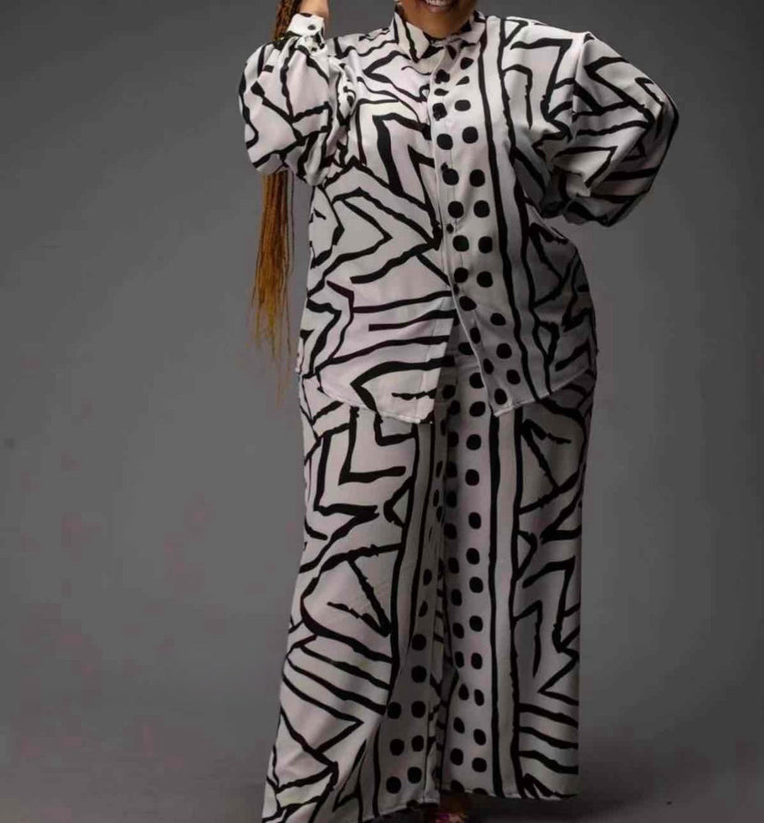 Printed loose-fit shirt with zebra pattern, puff sleeves, and button front