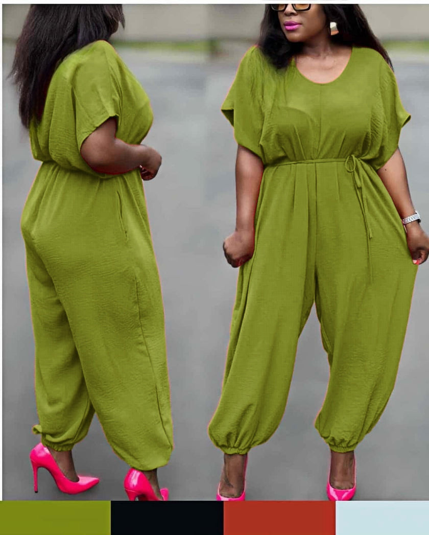 Yellow-green cinched-waist jumpsuit with drawstring, loose wide legs, ankle cuffs