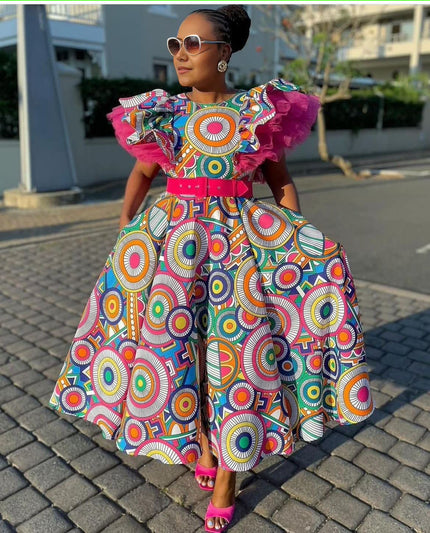 Colorful patterned midi dress with puff sleeves and ruffled skirt