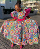 Traditional Circular Pattern Decorated Dress with Cinched Waist and Mid-Calf Design