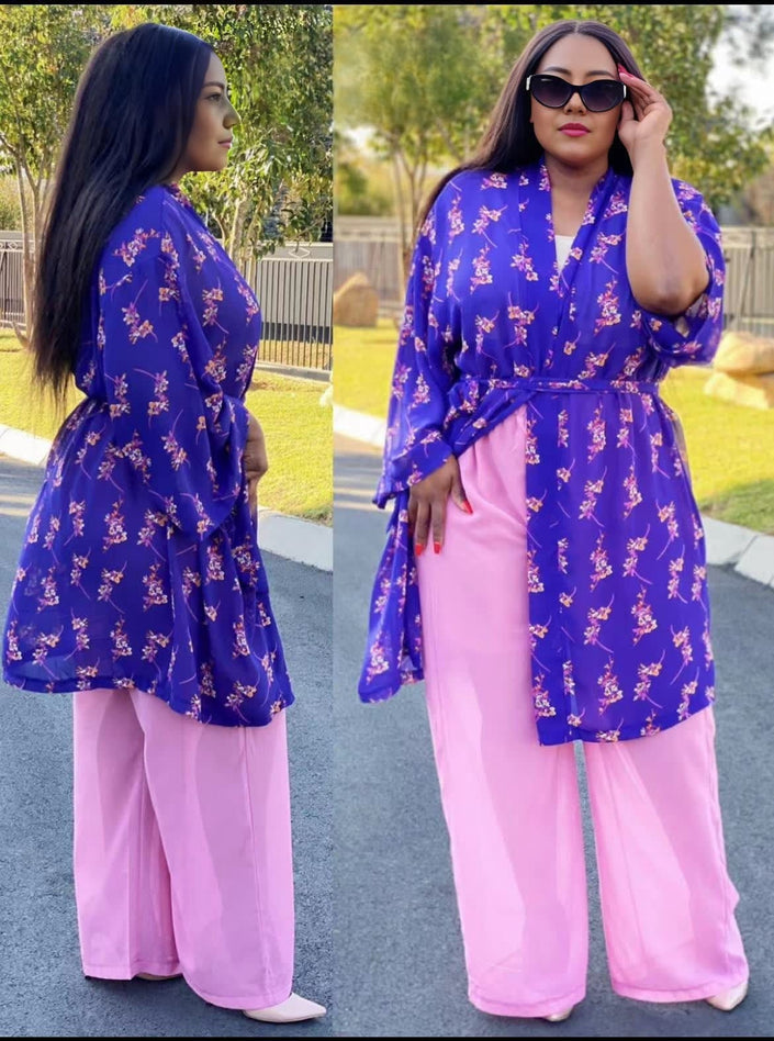 Purple floral wide-sleeve top with V-neck and matching wide-leg pants.