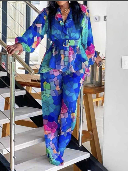 Printed blouse and trousers set with vivid geometric multicolor pattern, blue base