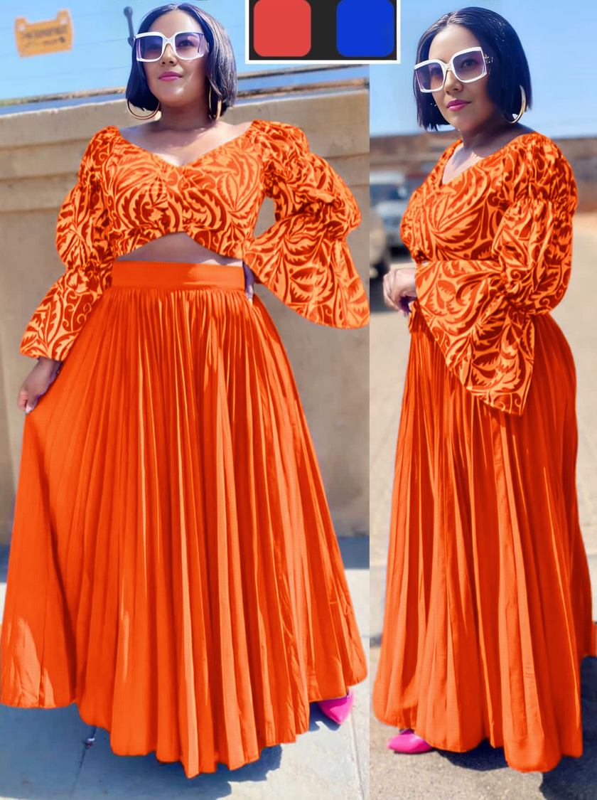 Orange puff-sleeve pleated maxi dress with cropped bodice and V neckline