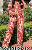 Geometric twin set printed shirt and wide-leg trousers in red and white