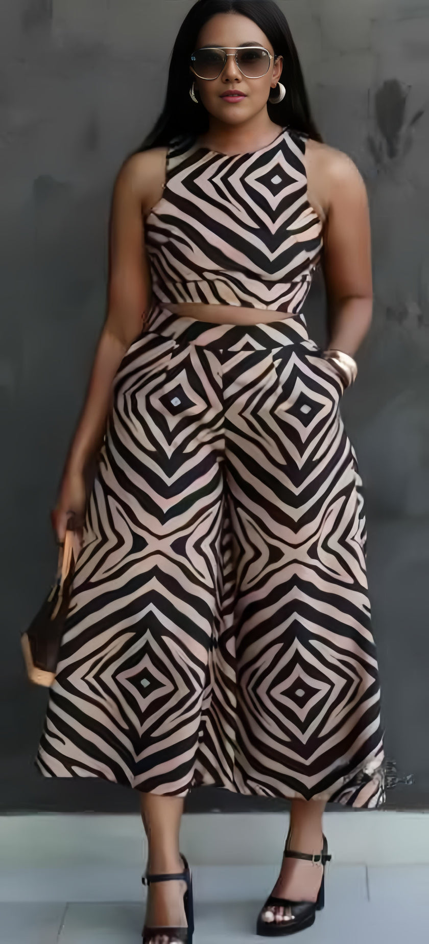 Geometric twin set with sleeveless cropped top and wide-leg pants, zigzag pattern