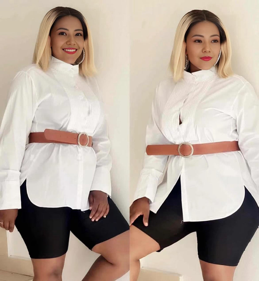 White structured button-up shirt with prominent collar, long sleeves, asymmetric hem