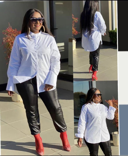 White long-sleeve button-up shirt with extended cuffs and pointed collar