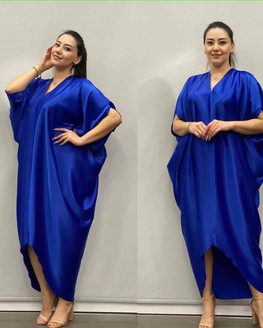 Blue asymmetrical kaftan dress with one-sleeve V-neck, loose draped silhouette