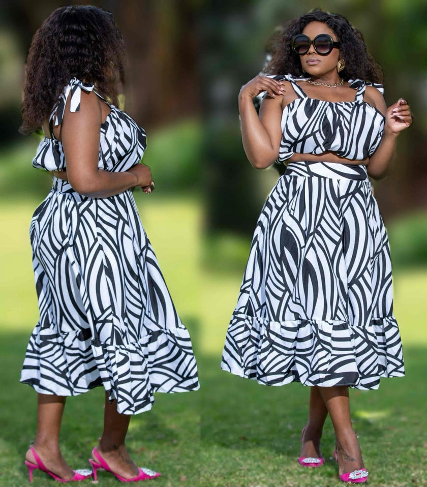 Black-and-white zebra stripe twin set with ruffle-hem midi skirt and off-shoulder top