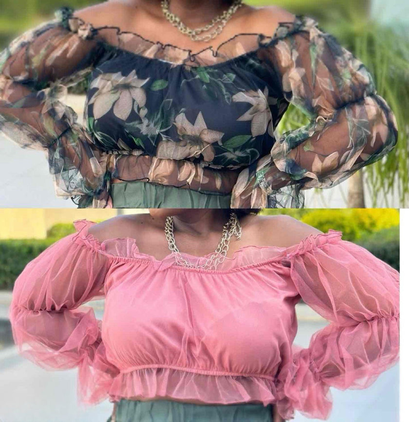 Pink sheer blouse with ruffle trim and voluminous puff sleeves