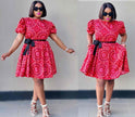 Red floral mini dress with puff sleeves and black belt, flared skirt