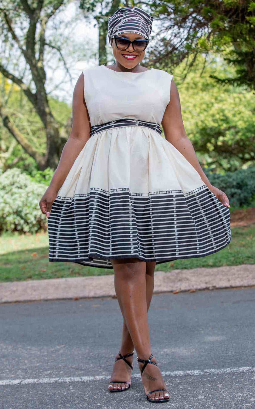 Sleeveless Flared Dress with Horizontal Stripe Skirt