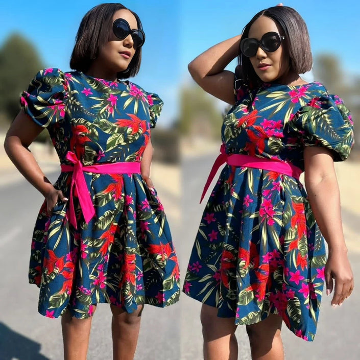 Floral puff sleeve mini dress with pink belt, dark green with red and blue flowers