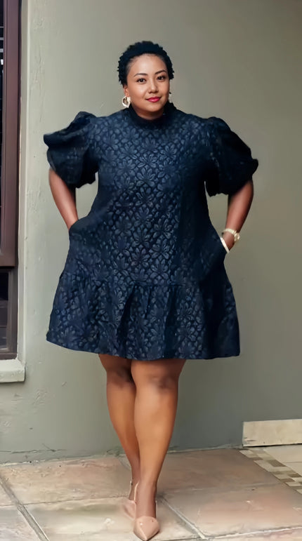 Black lace mini dress with puff sleeves and gathered flared skirt