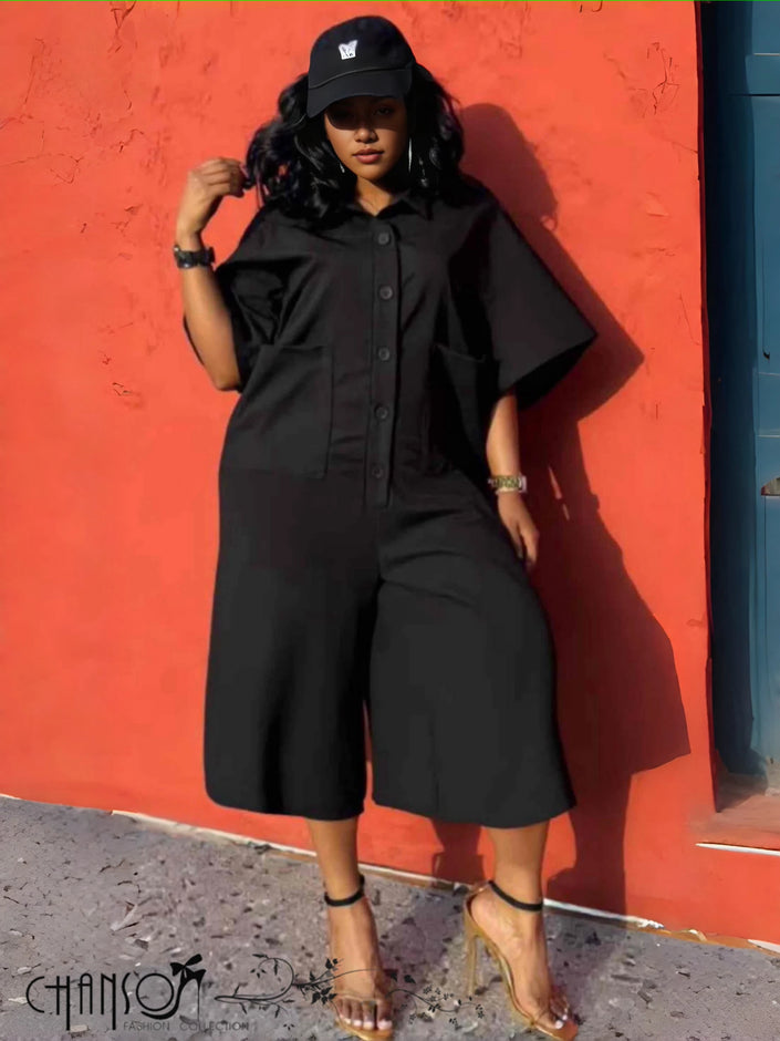 Black utility-pocket jumpsuit set, button-front top and wide-leg culottes
