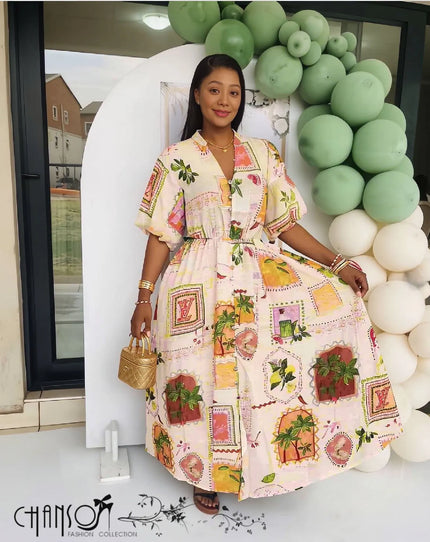 Off-white geometric print maxi dress with puff sleeves and full gathered skirt.