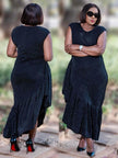 Navy glitter sleeveless asymmetrical midi dress with draped back and layered hem