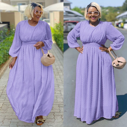 Light-purple maxi dress with cinched waist and puff sleeves, long swing silhouette
