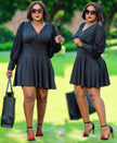 V-neck flared skater dress, long sleeves, dark solid fabric, pleated skirt