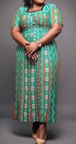 Geometric knit maxi dress in green with striped pattern and square neckline, short sleeves