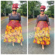 Maxi skirt with sunflower floral print in red, yellow, and green