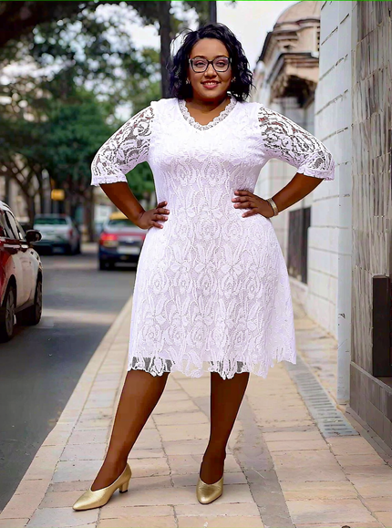 White lace midi dress with floral overlay, short sleeves and scalloped hem