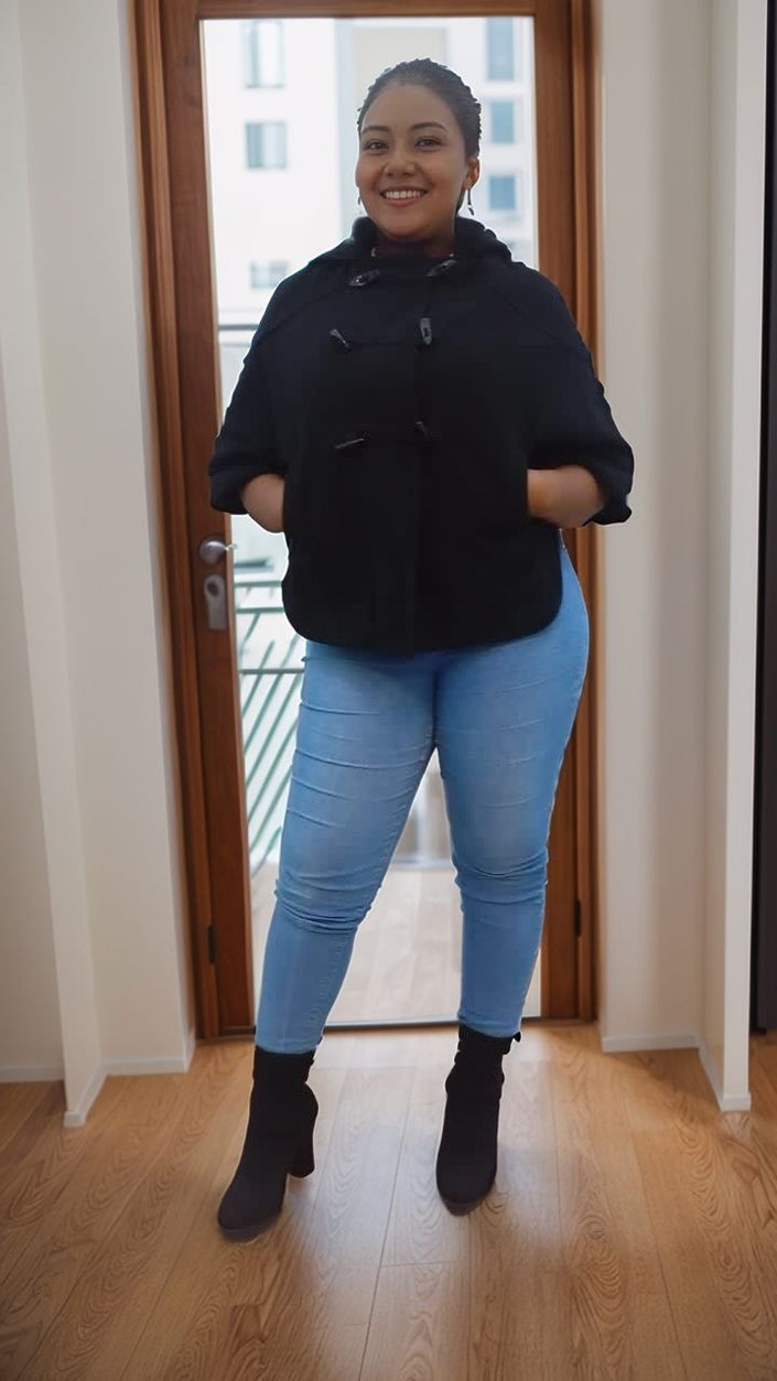 Loose-fit hooded short coat, dark fabric, front pockets, full-length sleeves