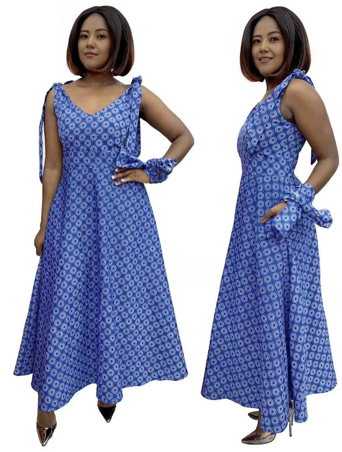 Blue patterned A-line V-neck dress with adjustable straps, high-low hem