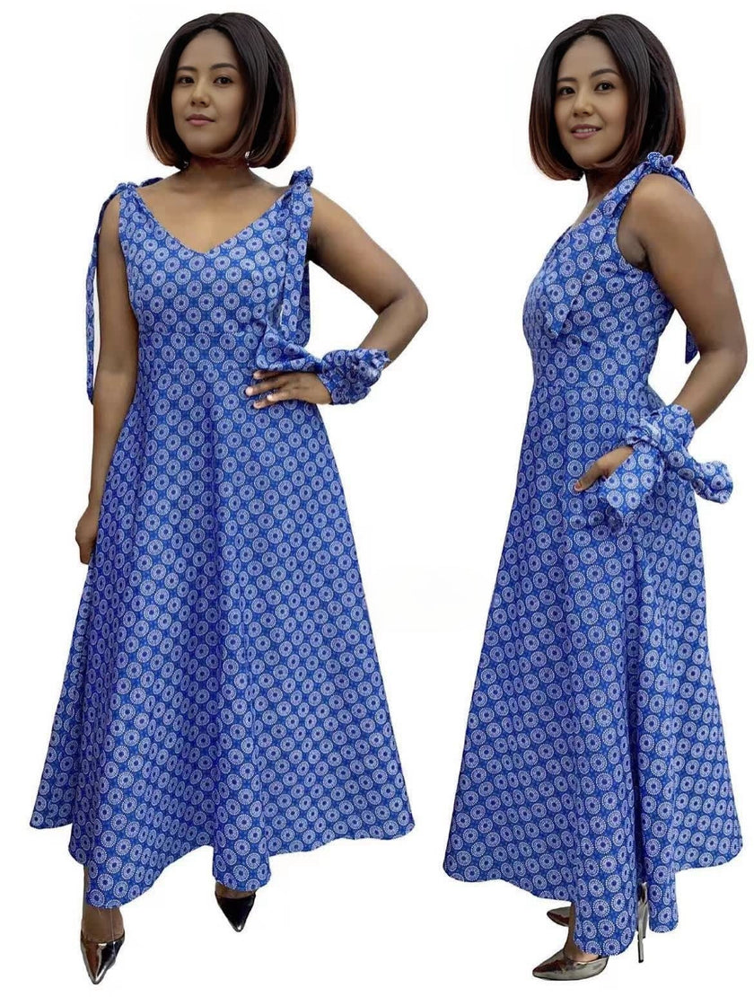 Blue patterned A-line V-neck dress with adjustable straps, high-low hem