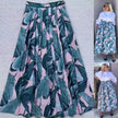High-waist flowy skirt with tropical leaf print, teal and pink