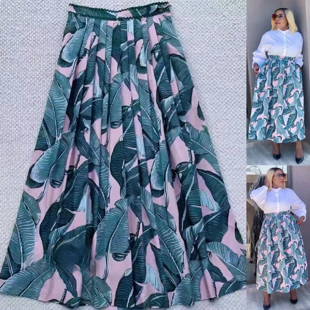 High-waist flowy skirt with tropical leaf print, teal and pink