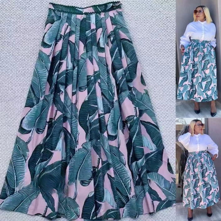 High-waist flowy skirt with tropical leaf print, teal and pink