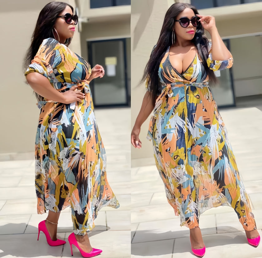 Printed V-neck maxi dress with short sleeves, colorful abstract pattern and fitted waist.