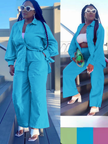Light-sky-blue loose shirt and straight-leg pants twin set, long sleeves, belted waist.