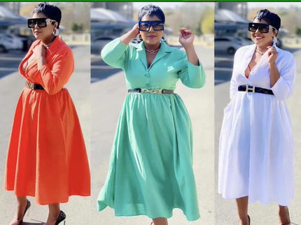 Orange-red midi shirt dress with long sleeves, collar, and waist belt