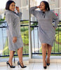Long Sleeve Houndstooth Dress with Knee-Length Hem and Tie-Neck Detail