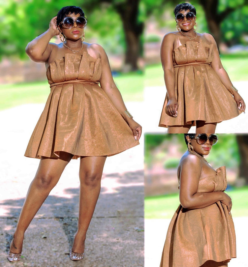 Bronze shimmering strapless pleated mini dress with fitted bodice and skirt gathers